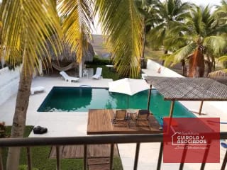 CASA EN VENTA EN EL MAR CHULAMAR 025CVMD — Casa vacacional en Venta en Chulamar, Puerto San José, Escuintla — miniatura 1 de 15