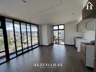 APTO NIVEL ALTO C/ VISTA	 2 HAB. / EDIFICIO IQ10 Z.10 — Apartamento en Venta en Zona 10, Guatemala, Ciudad — miniatura 1 de 10